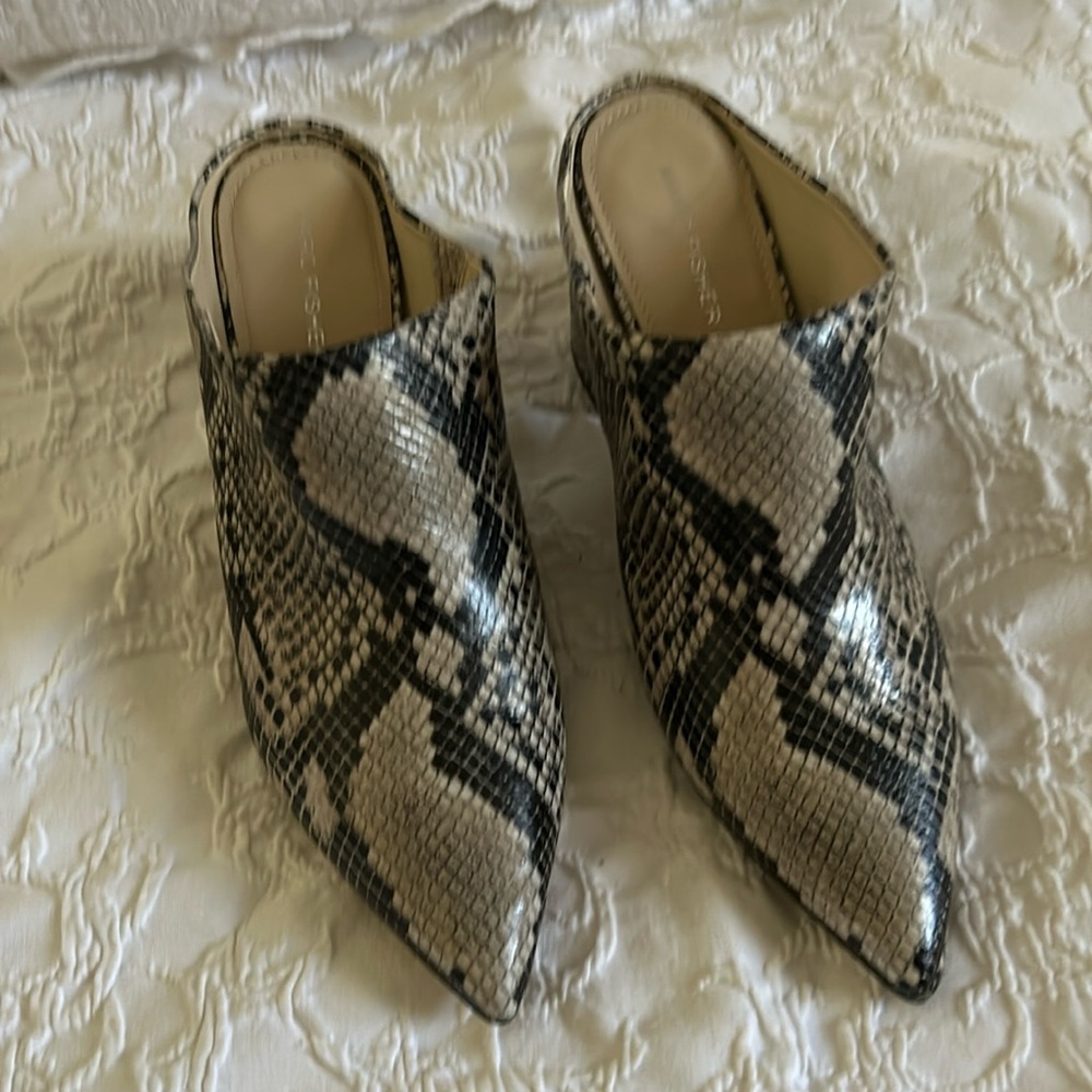 Marc Fisher , mules aren’t mushy ,They are well constructed, sturdy.